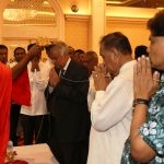 A large group of invitees including clergy of different religions  attended  a tea party at Temple Trees to mark the start of the New Year.  Picture shows Prime Minister Ranil Wickremasinghe receiving blessings from a member of the Buddhist clergy. (PM’s media unit)
