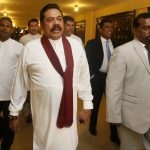 Former President Mahinda Rajapaksa arrives in Parliament to participate in the no-confidence motion vote.