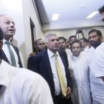 Prime Minister Wickremasinghe,flanked by UNP Members of Parliament and Cabinet Ministers after the defeat of the no-confidence motion.