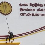 This man is whitewashing the name board of the Ceylon Electricity Board. But the rot inside is there for all to see.