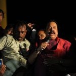 A visibly tired but jubilant former President Mahinda Rajapaksa came back to Lake House roundabout early in the night to make a short address to the protestors who had settled down for the night.