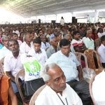A group of people who recently received the deeds for a parcel of land, by the government.  The long drawn out ethnic conflict displaced Sinhalese, Tamils and Muslims who are waiting the return of their land, nearly ten years after the war ended.