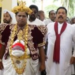 Newly appointed ministers make it a point to pay obeisance at the Temple of the Tooth, Kandy. Here, Mahinda Rajapaksa seen at the Temple soon after his appointment as Prime Minister.