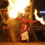 A traditional dancer performs during a Gara demon ceremony  in Kottawa about 20 km from Colombo