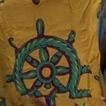 A Dharmachakra or a Ships Wheel?  The dress allegedly worn by the woman.